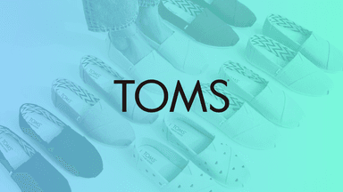TOMS Shoes canvas slip-on alpargata shoes representing the company's One-for-One social impact business model case study